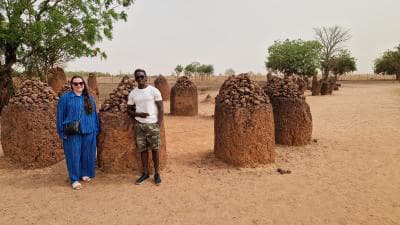 Guests visiting the stone circles with their guide in The Gambia.